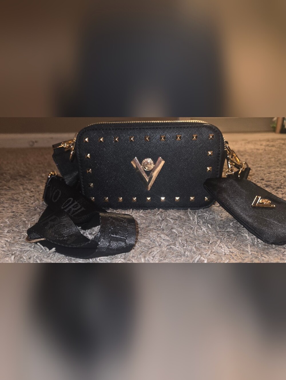 Black Crossbody Bag with Gold V Emblem and Stud Detailing
